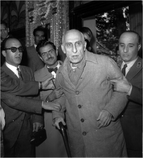 Mohammad Mossadegh entering the military tribunal, November 1953.